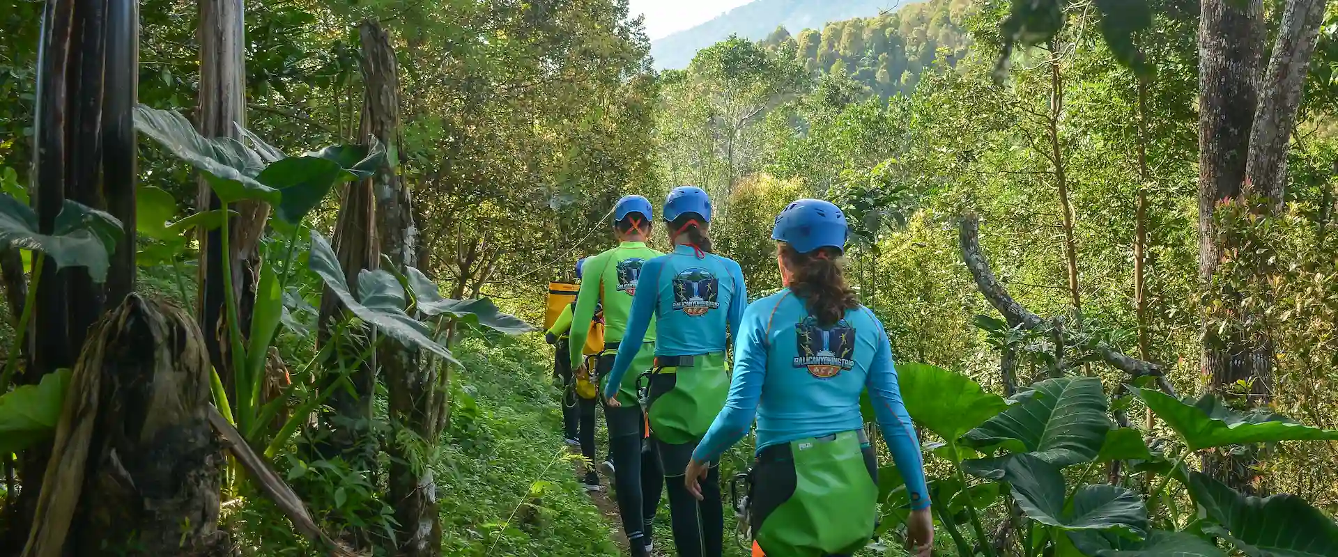 A guided group making its way through a North Bali canyon