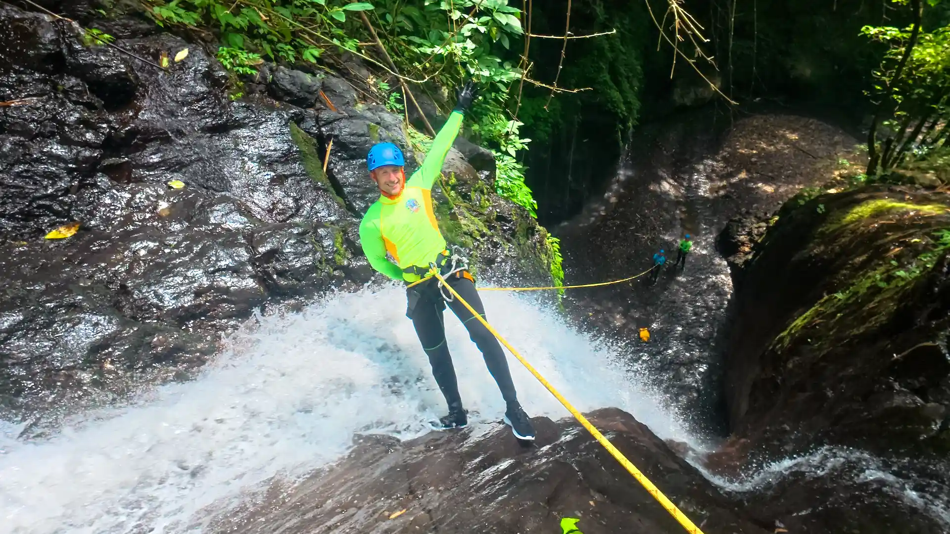 Rappelling down a waterfall in North Bali